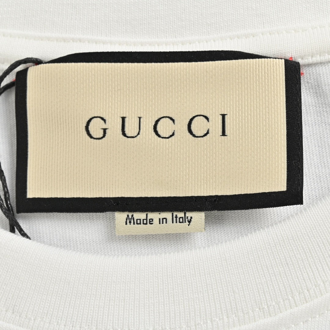 Gucci White T-Shirt with Pink Dinosaur Graphic