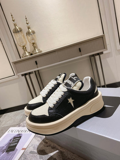 Golden Goose Cream and Black Star Sneakers