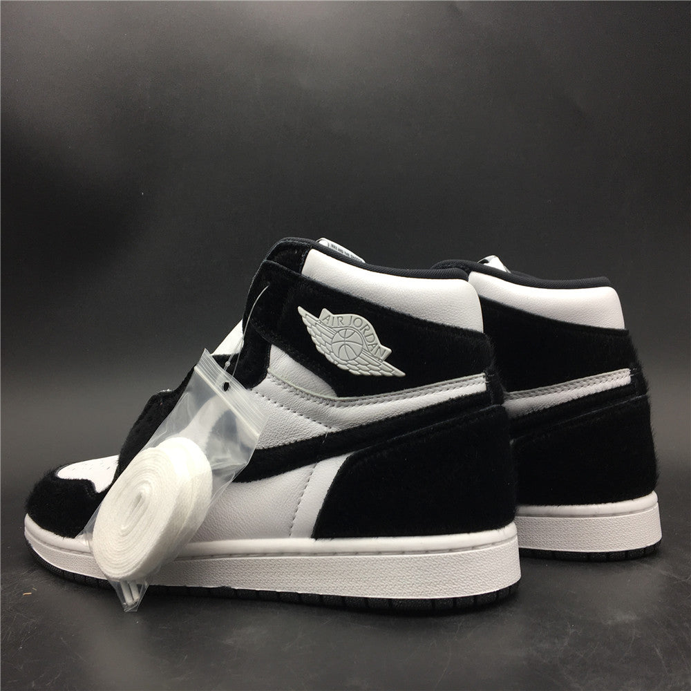 Iconic silhouette, Panda-inspired colorway, Striking design, Black and white combination, Premium materials, Comfortable fit, Nike Air cushioning, Fashion-forward statement, Standout sneakers, Self-expression.